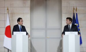 Prime Minister Fumio Kishida and French President Emmanuel Macron deliver a joint statement in Paris in January 2023.