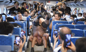 Japan bullet trains host wrestling, dining events in new travel trend